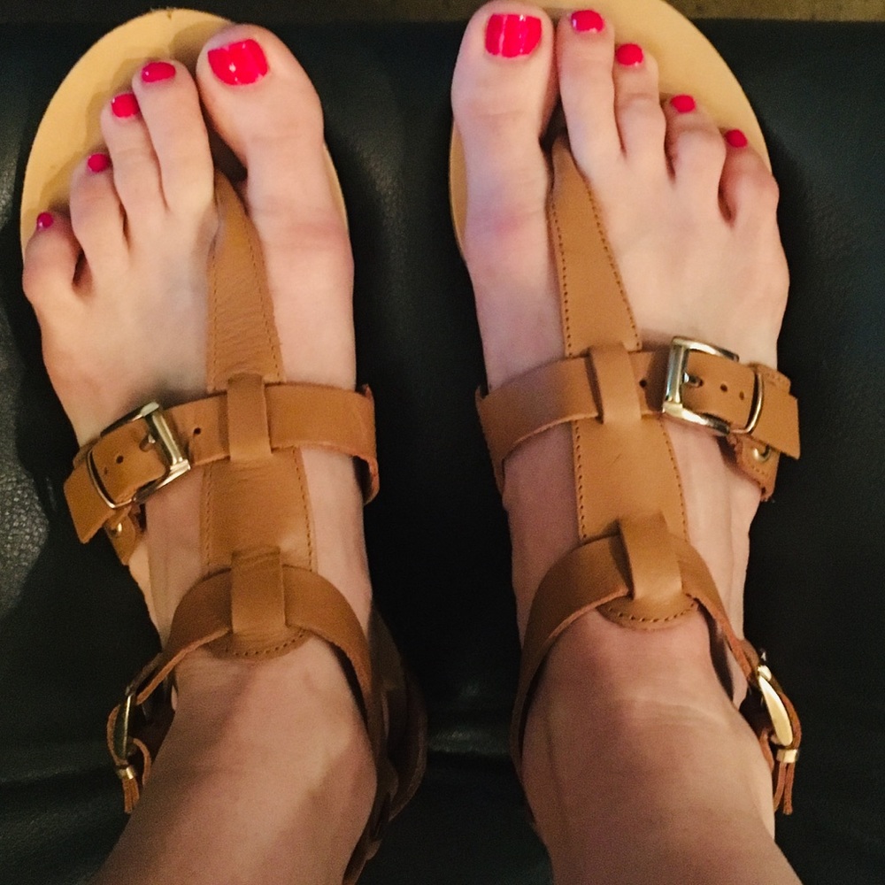 Tan or black Aldo closed back sandals.